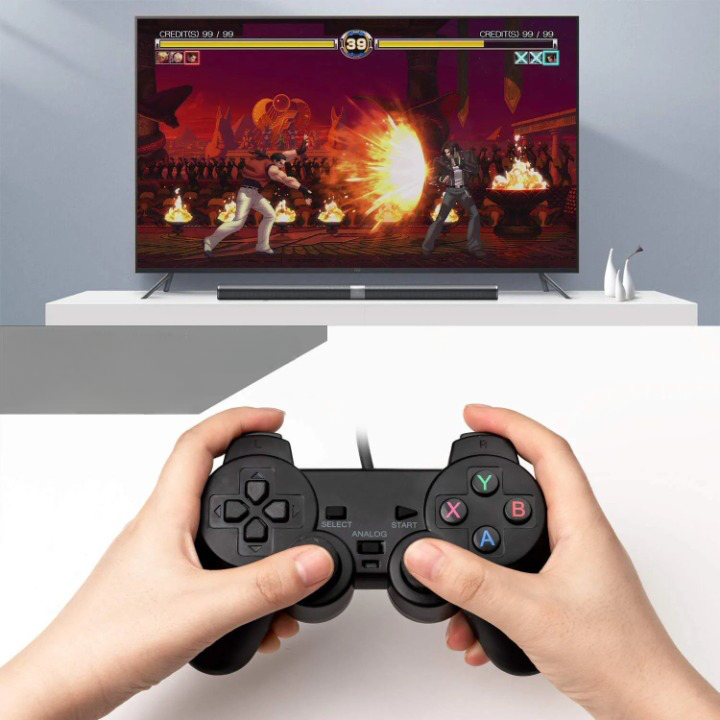 En action avec la manette Niye pour PS2